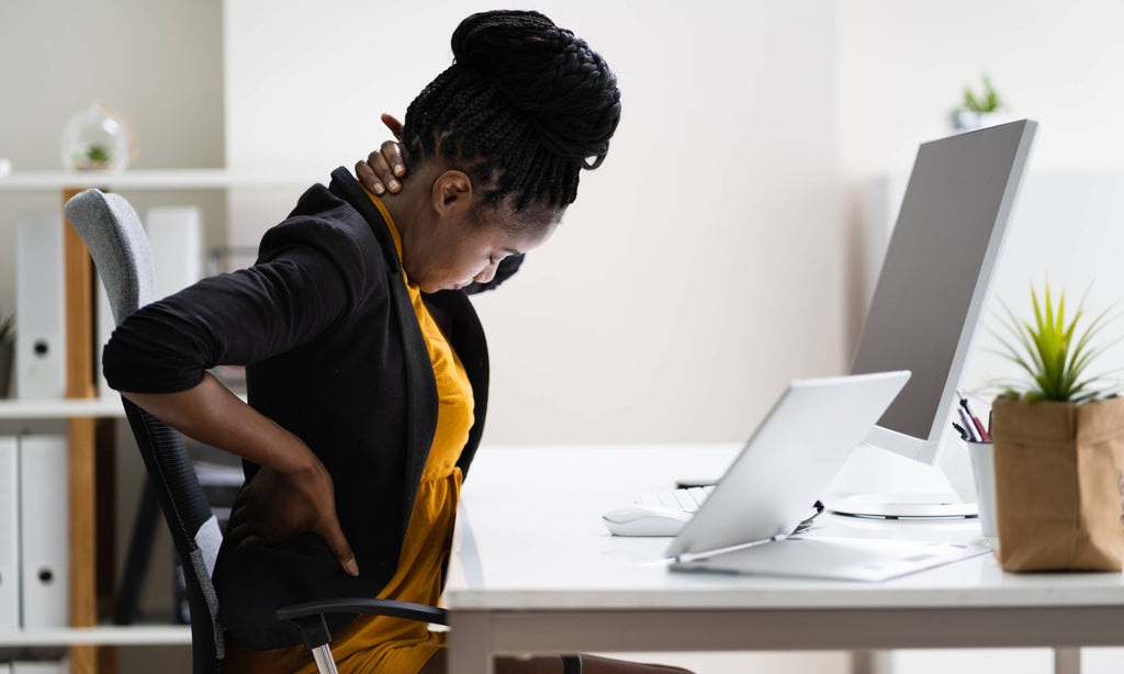 4 Ergonomic Tips to Ease Back Pain in the Office